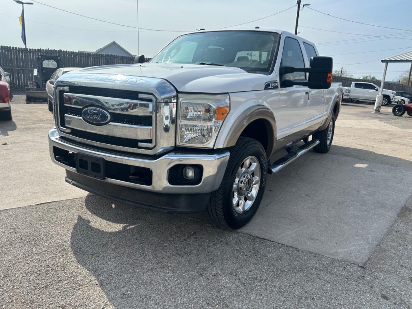 2014 White Ford F-250 SD King Ranch Crew Cab 4WD (1FT7W2B61EE) with an 6.2L V8 OHV 16V engine, 6-Speed Automatic transmission, located at 1687 Business 35 S, New Braunfels, TX, 78130, (830) 625-7159, 29.655487, -98.051491 - Photo#0